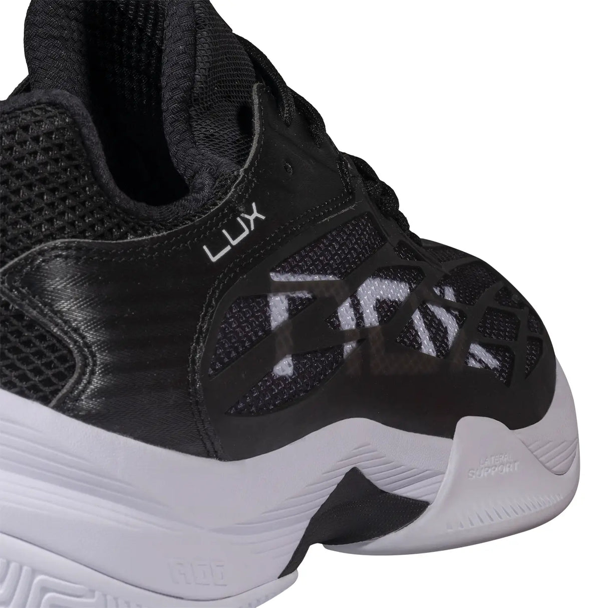Black athletic shoe with NOX branding on a white background