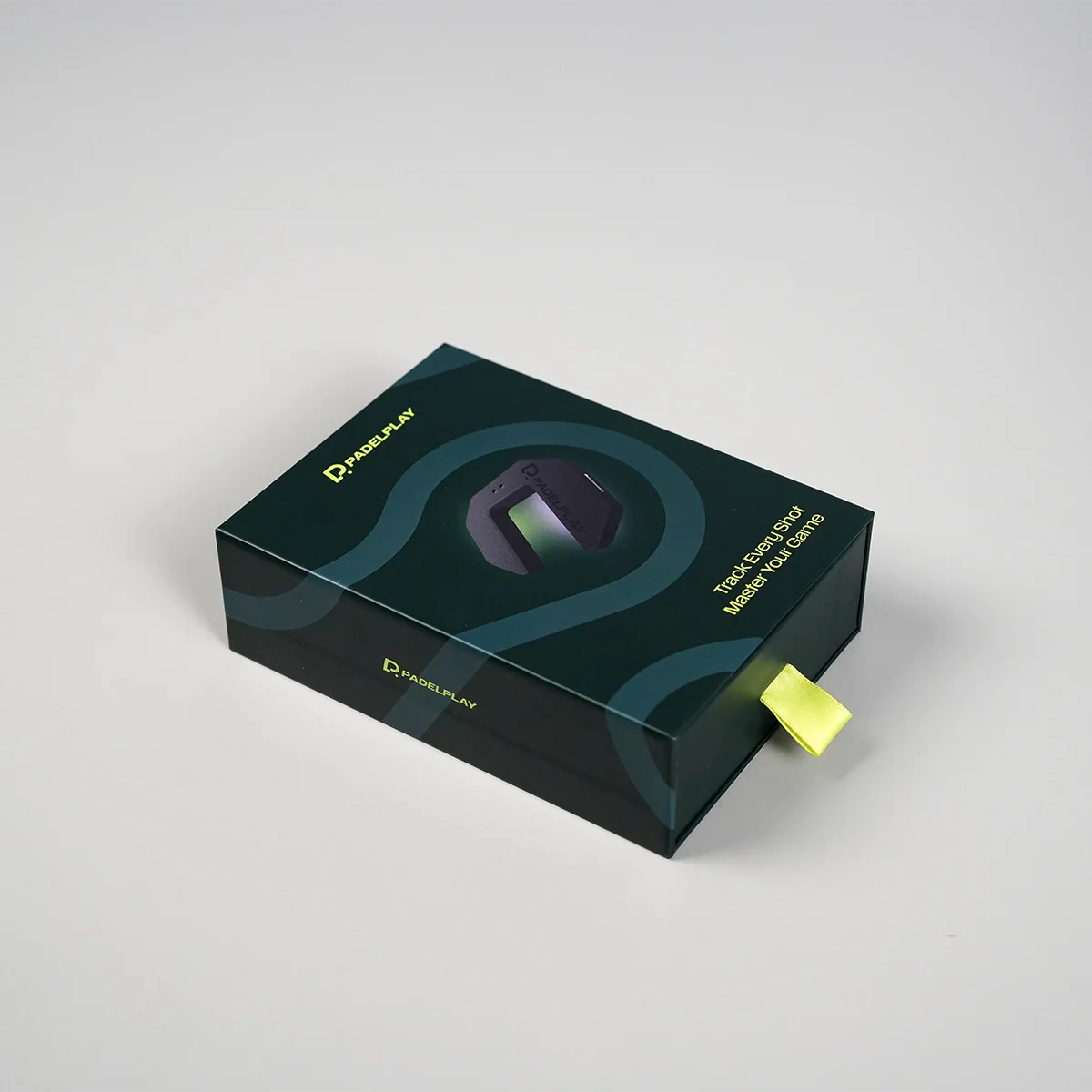 Padelplay AI product packaging box on a gray background