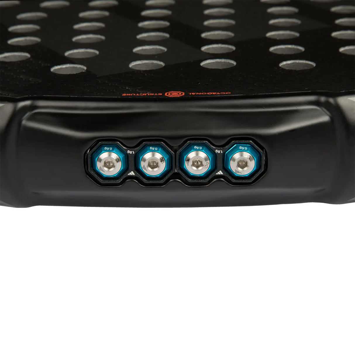 Close-up of a black pad with metallic rivets on a white background