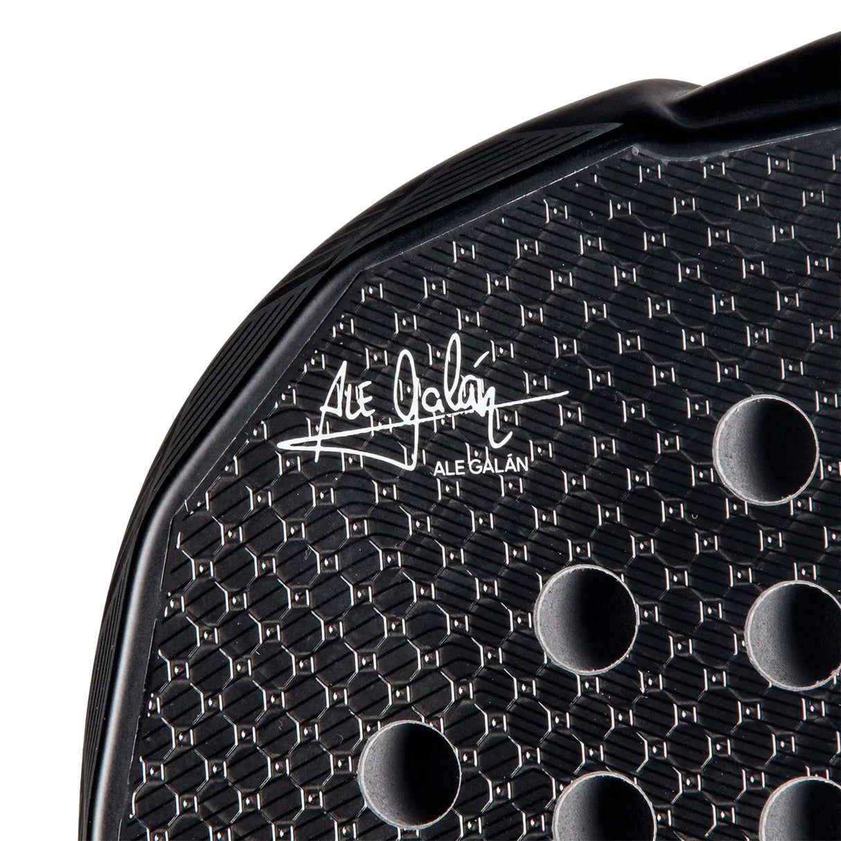 Close-up of a black shoe sole with a brand logo on a white background
