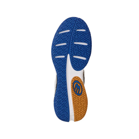Close-up of a shoe sole with blue and brown design on a white background