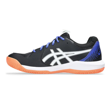Black and blue athletic shoe with orange sole on a white background