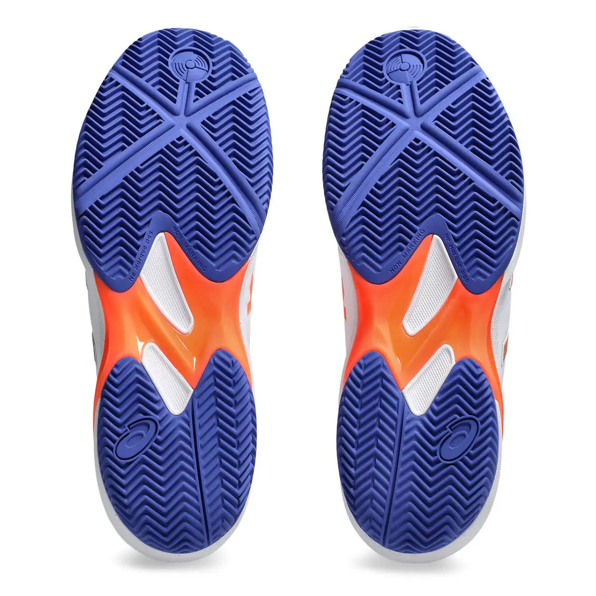 Close-up of a pair of sports shoes with blue soles on a white background