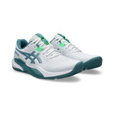 White and green athletic shoes on a white background