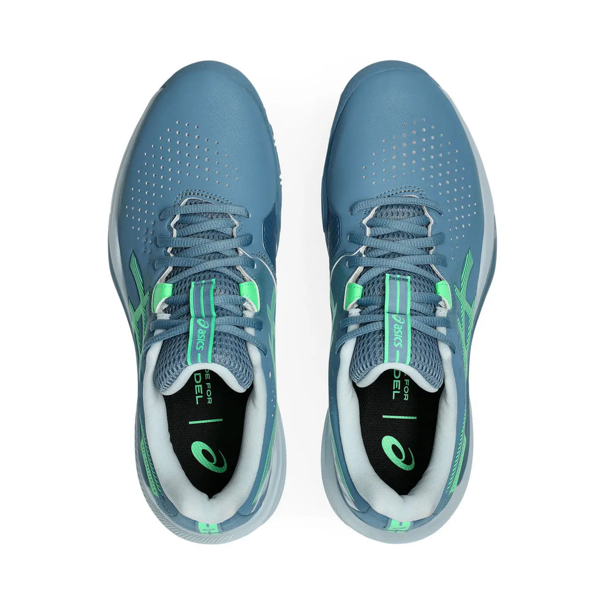 Pair of blue running shoes with green accents on a white background