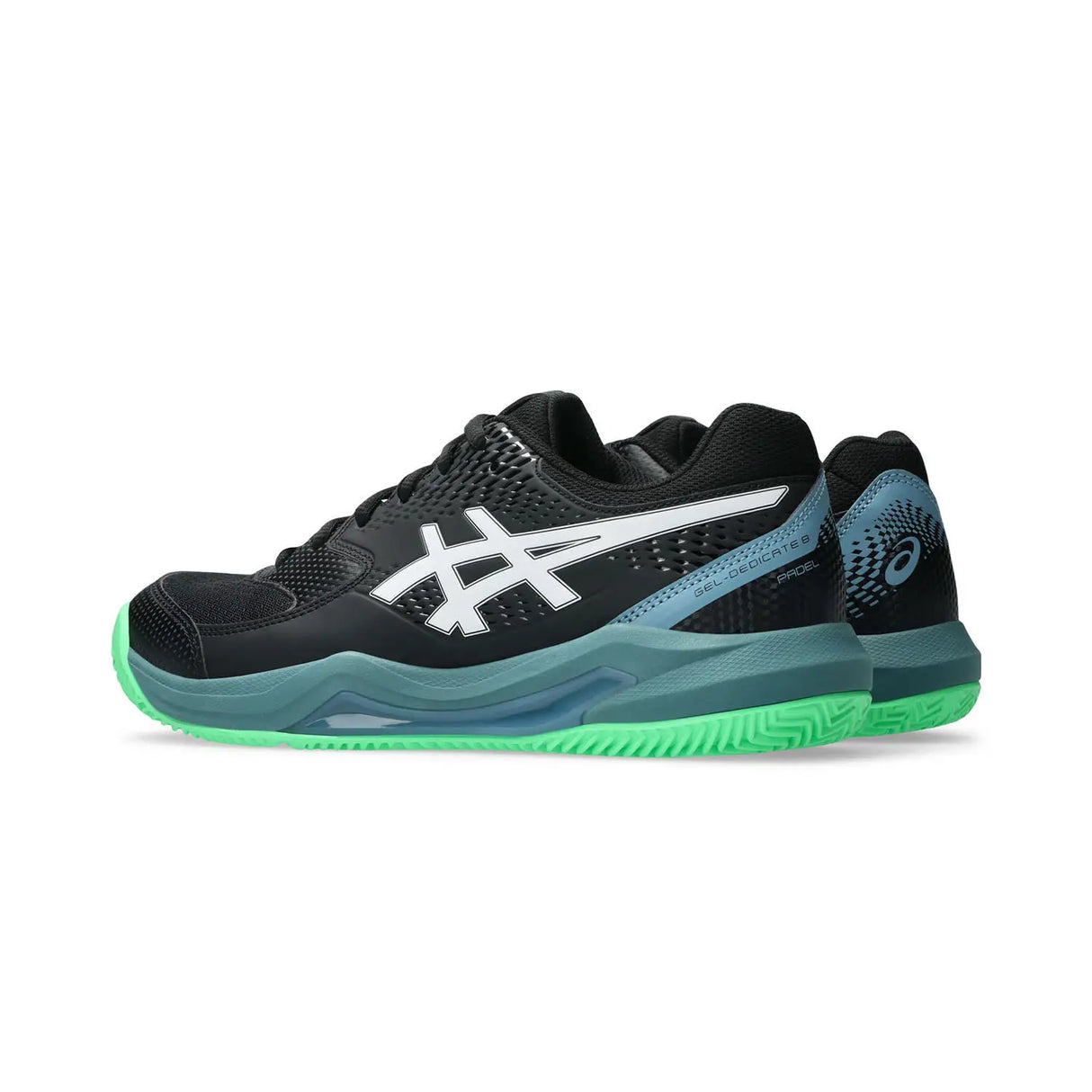 Black and green athletic shoe on a white background