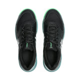 Black running shoes with green accents on a white background