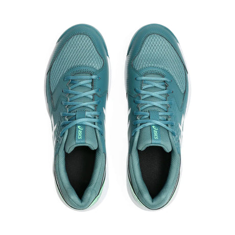 Pair of teal running shoes on a white background