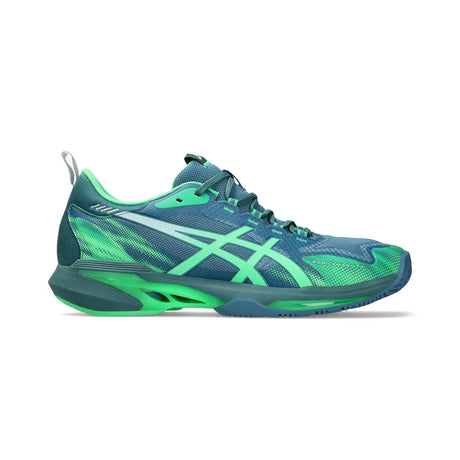 Blue and green running shoe on a white background
