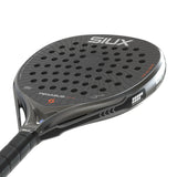 Padel racket with 'SIUX' branding on a white background