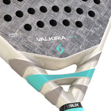 Close-up of a Valkiria Pro padel racket with visible branding on a white background