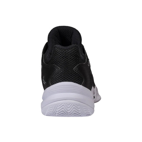 Black athletic shoe with white sole on a white background