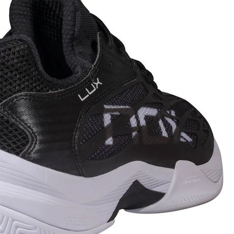 Black athletic shoe with NOX branding on a white background