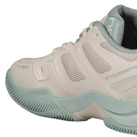 Beige and light blue athletic shoe on a white background