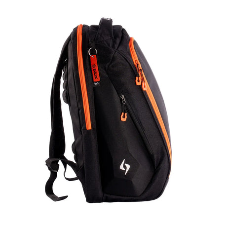 Black backpack with orange zippers on a white background