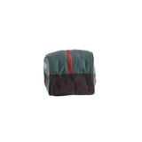 Green and black bag with red accents on a white background