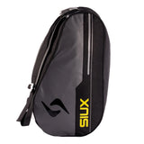 Black and gray sports bag with yellow branding on a white background