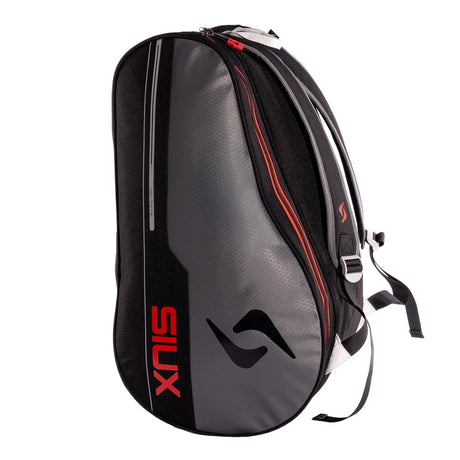 Black and gray backpack with red accents and a visible brand logo on a white background