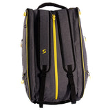 Gray backpack with yellow zippers on a white background