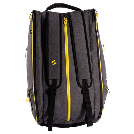 Gray backpack with yellow zippers on a white background