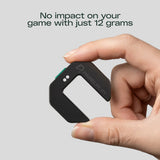 Hand holding a small black device with 'PADELPLAY' branding