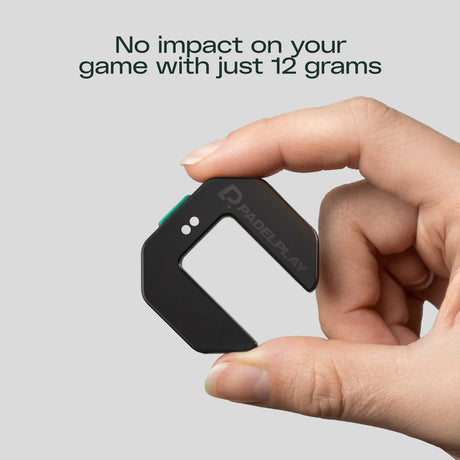 Hand holding a small black device with 'PADELPLAY' branding